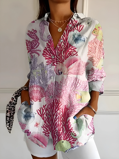 Elise  | Knappblus: Avslappnad passform och feminin stil