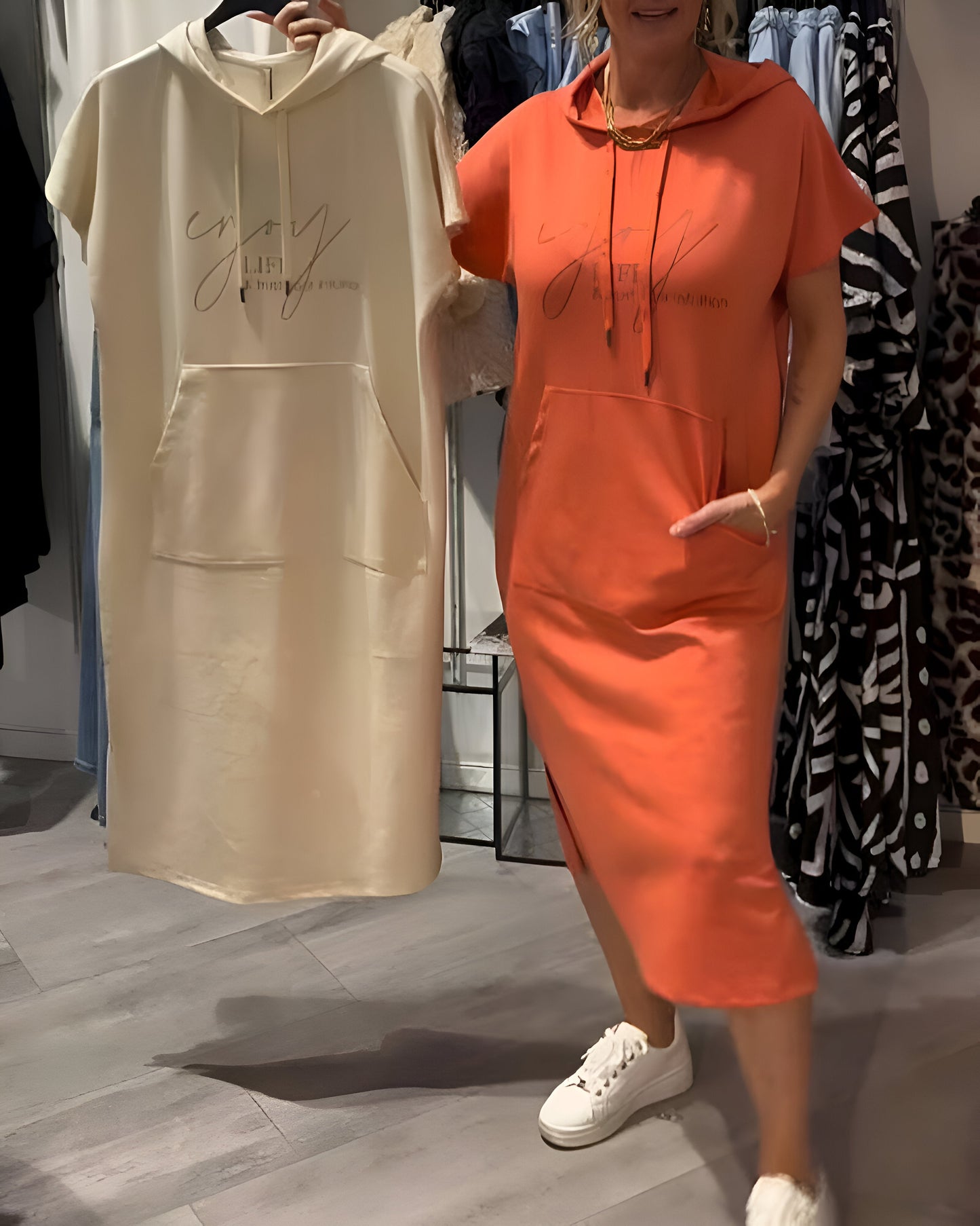 Hilda | Chic streetwear-hoodieklänning med dragskohuva