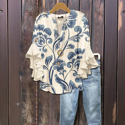 Astrée | Blommig blus med volangärmar och rak silhuett
