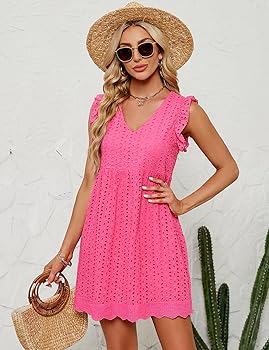 Tea | Miniklänning i bomull med delikat broderie anglaise och insydda shorts