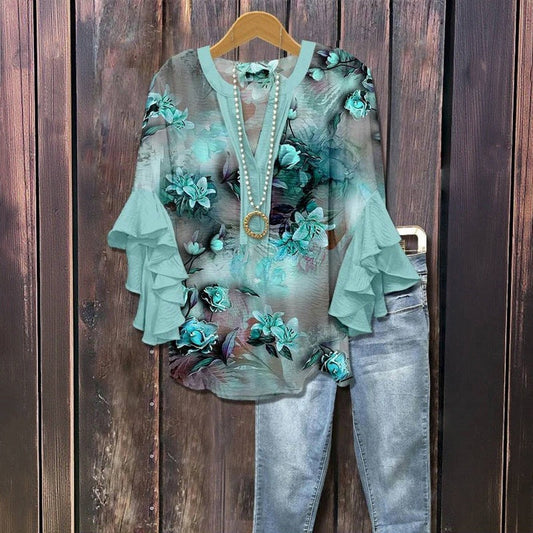 Astrée | Blommig blus med volangärmar och rak silhuett