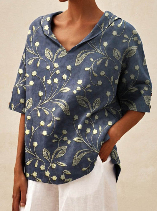 Auréa | Kortärmad blus med retroblommor och flip-krage