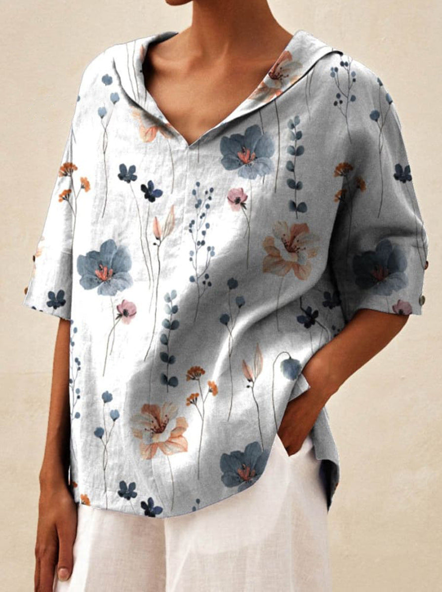 Auréa | Kortärmad blus med retroblommor och flip-krage