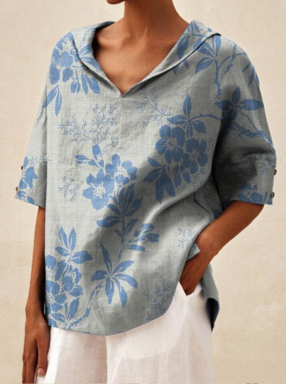 Auréa | Kortärmad blus med retroblommor och flip-krage