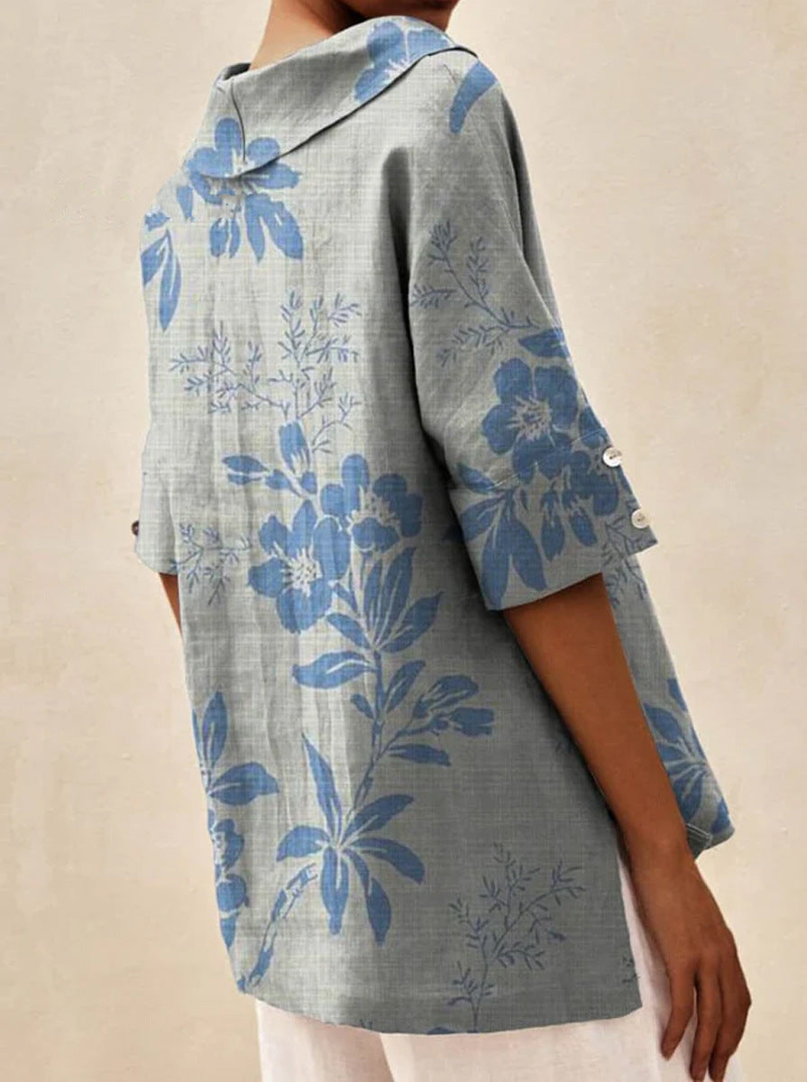 Auréa | Kortärmad blus med retroblommor och flip-krage