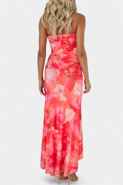 Elise | Bodycon-klänning med asymmetrisk ärm och stilrent blommönster